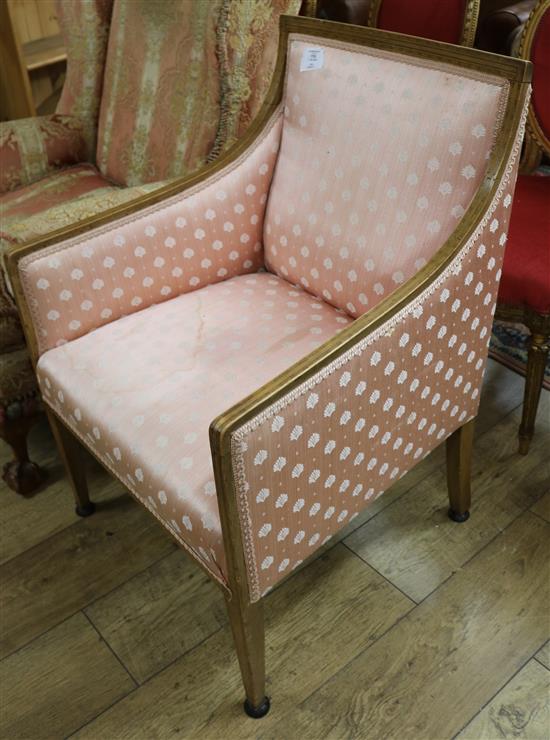 An Edwardian tub seat chair